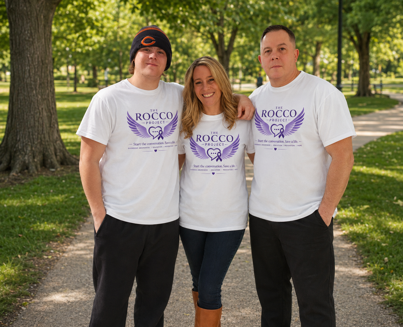 A family wearing Rocco Project shirts at the walk
